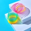 Kép 1/4 - Slinky lépcsőn lépegető spirál